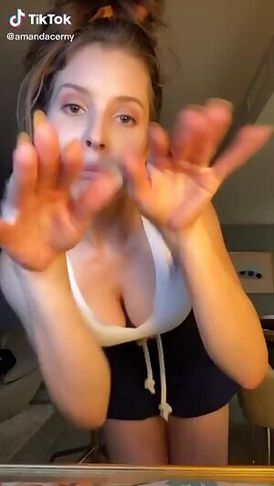 Good Lord Amanda Cerny can move, can I see her on her knees next?