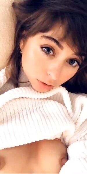 Riley looks cute playing with a toy