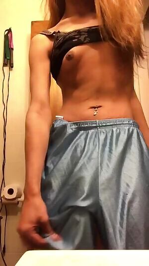 Playing under her skirt